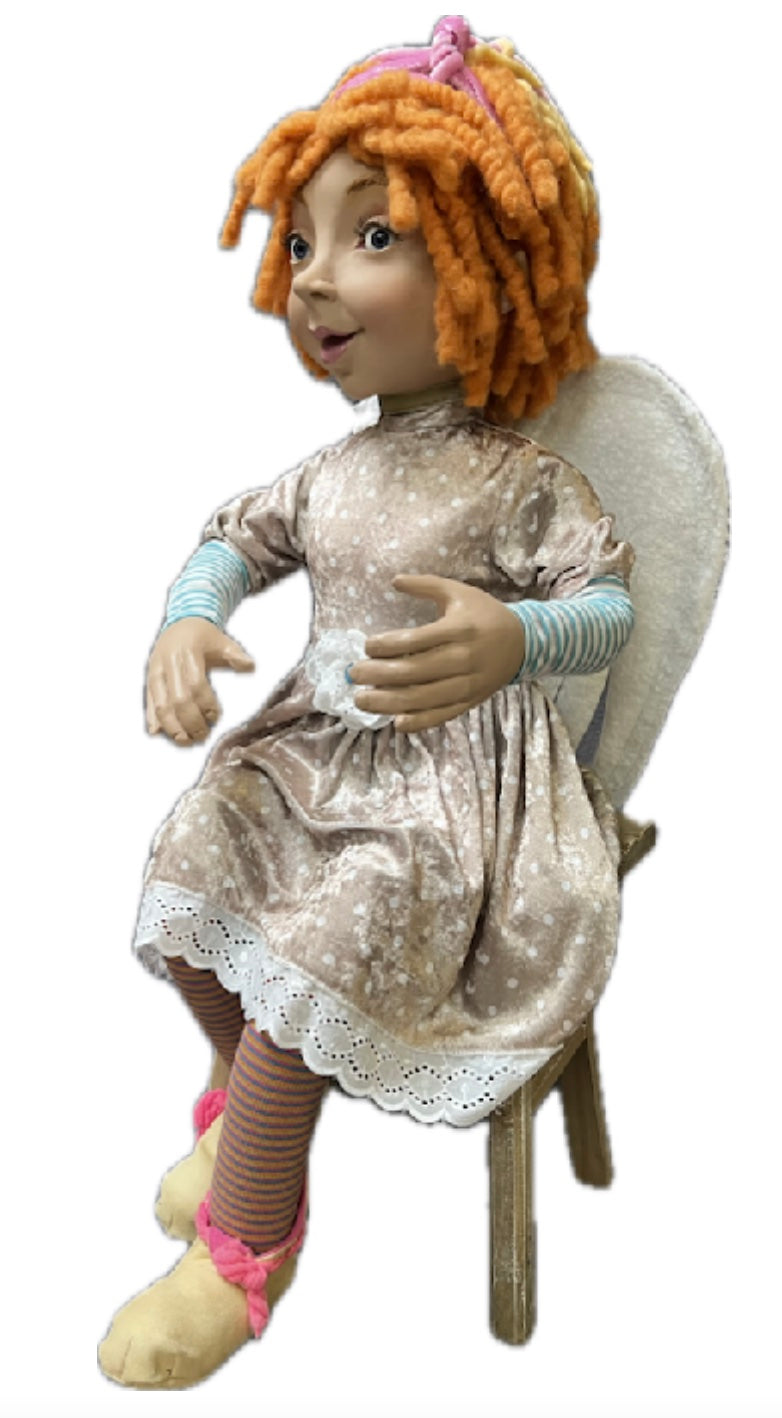 Sitting angel with orange hair