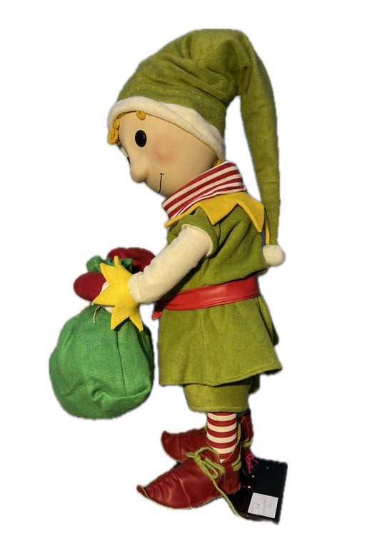 Elf with button eyes and a gift sack