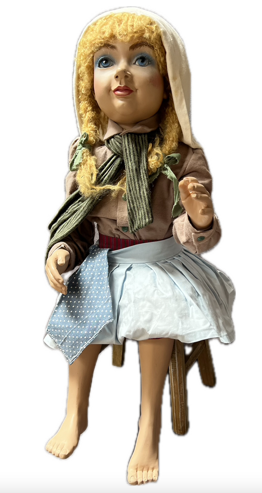 Cinderella blonde sitting on a stool