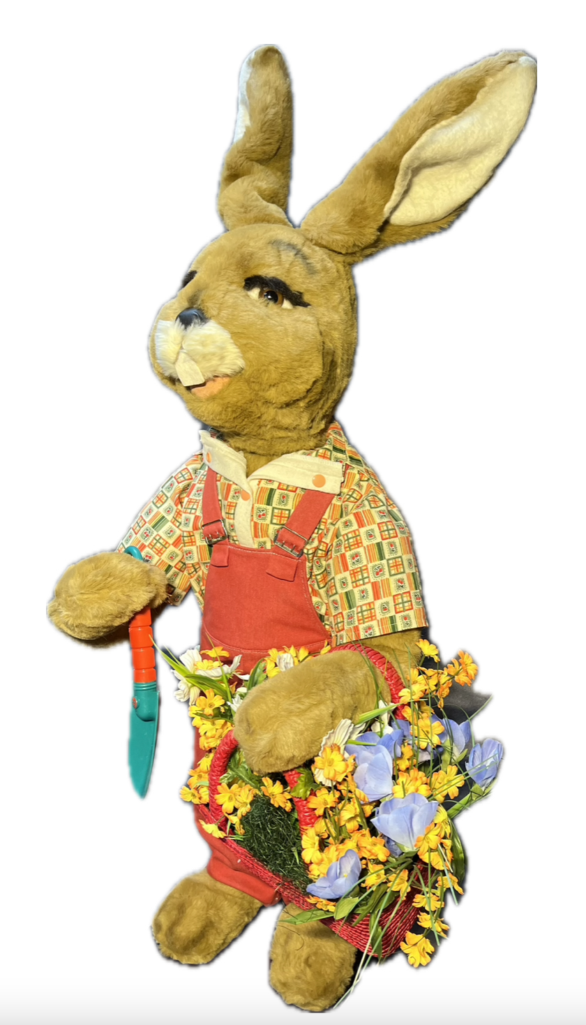 Rabbit with planting shovel and flower basket