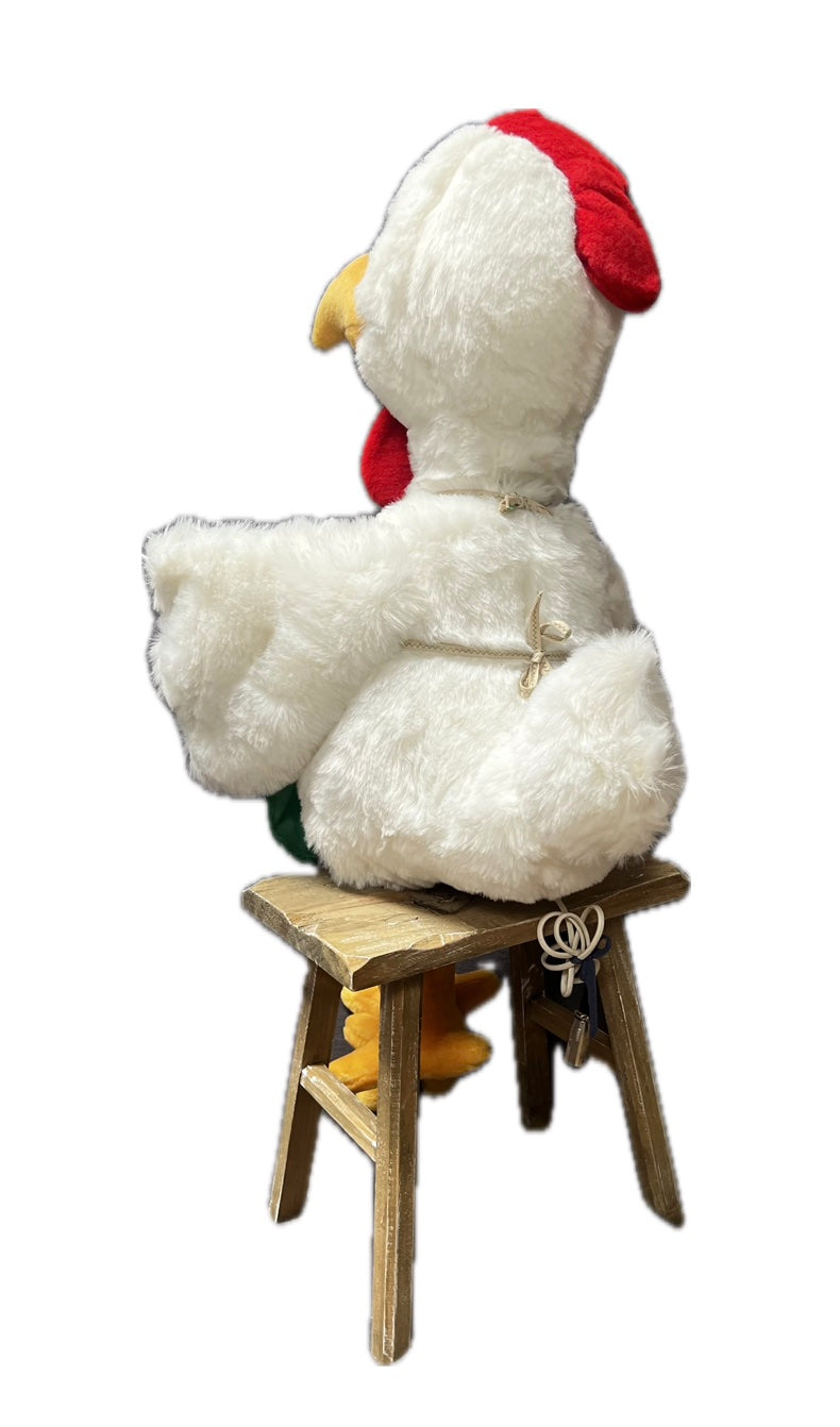 Chicken with green apron and egg