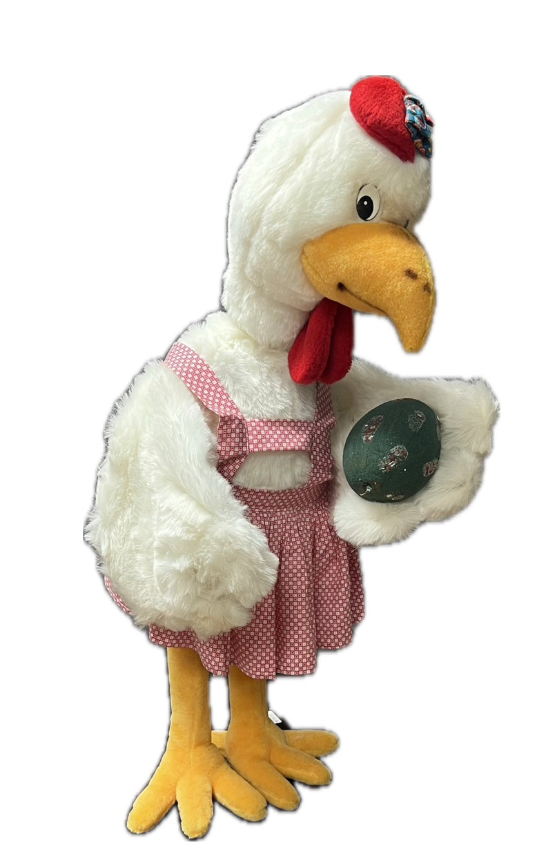 Chicken with pink apron and egg