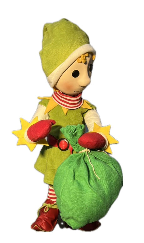 Elf with button eyes and a gift sack 