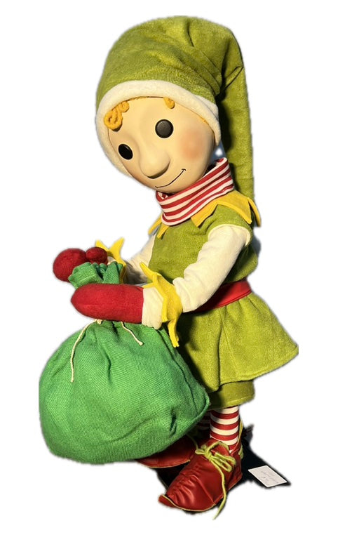Elf with button eyes and a gift sack 