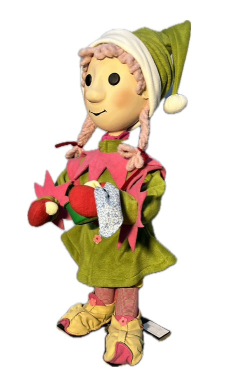 Elf girl with button eyes and pink braids and a mixing bowl (Christmas bakery) 