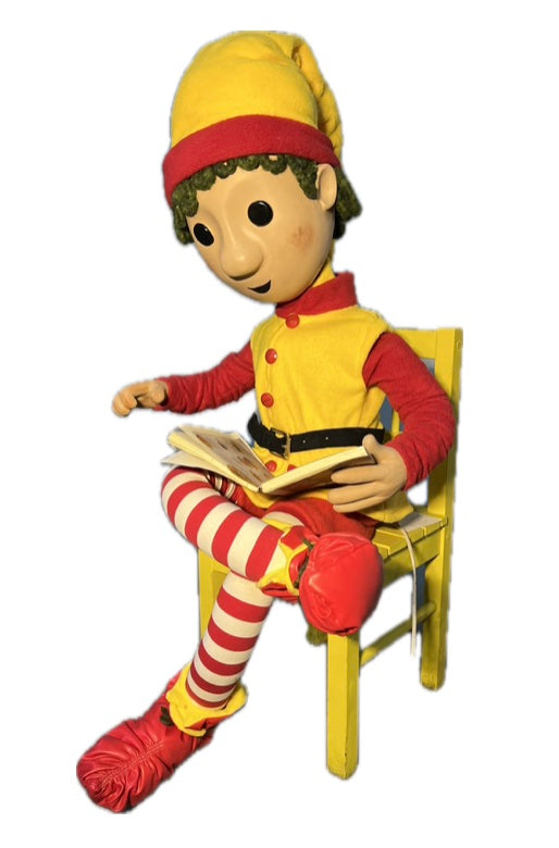 Button-eyed elf with recipe book (Christmas baking) 