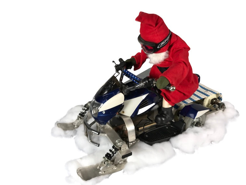 Santa Claus on a snowmobile