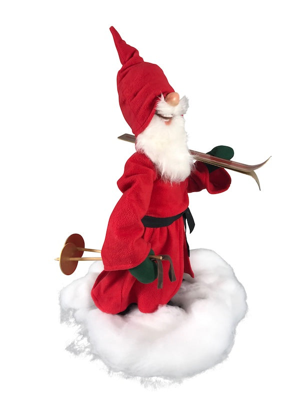 Santa Claus with skis on his shoulder