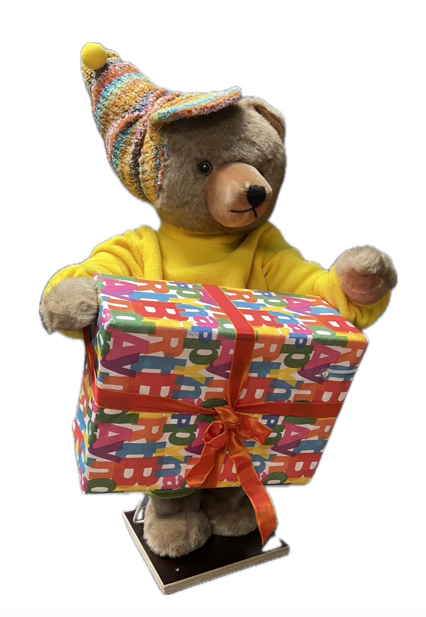 Teddy bear with large gift package 