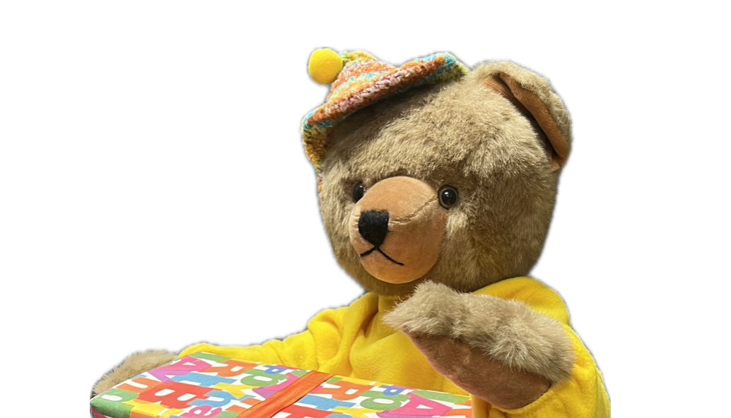 Teddy bear with large gift package 