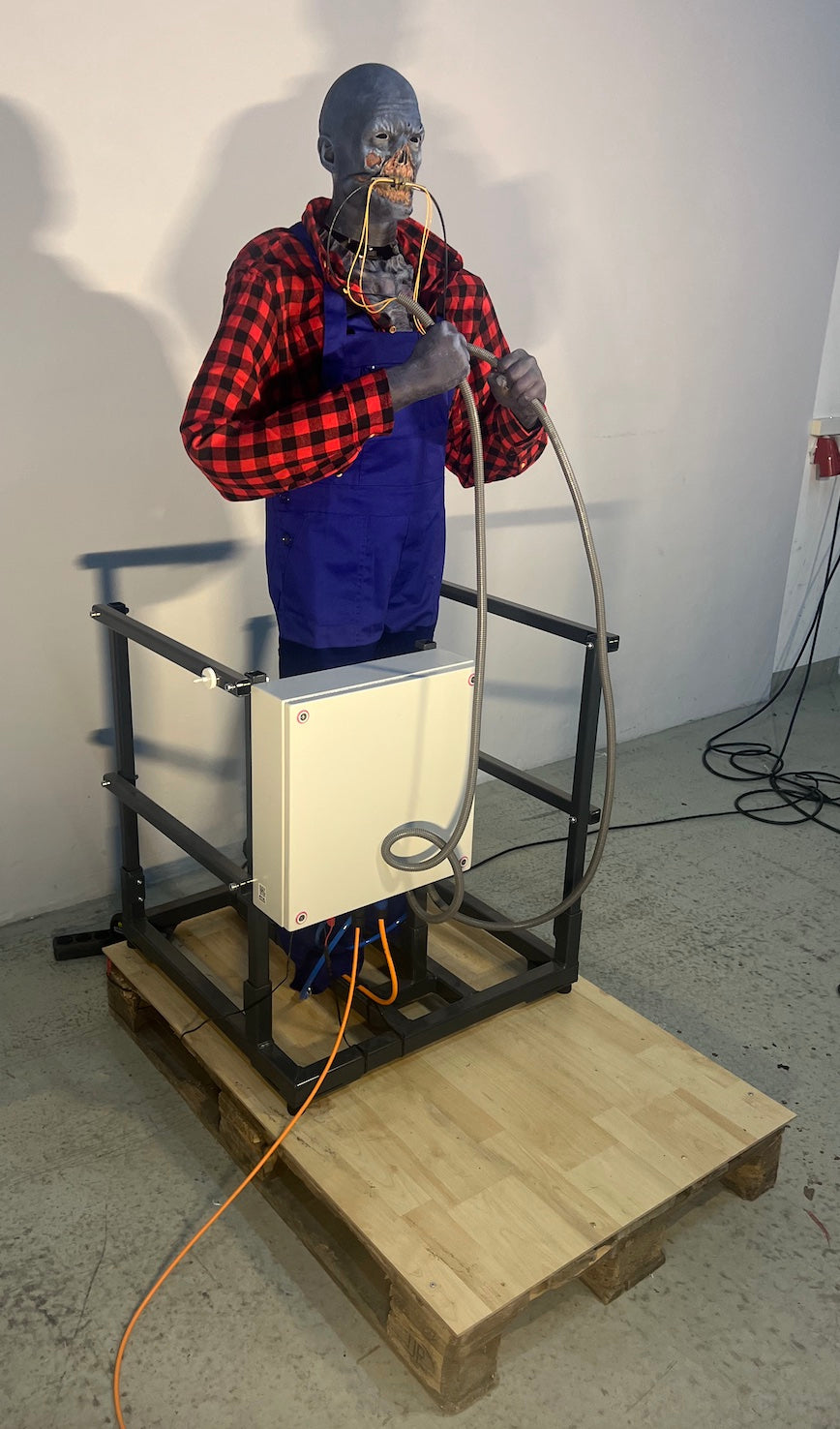Zombie electrician bites into cable