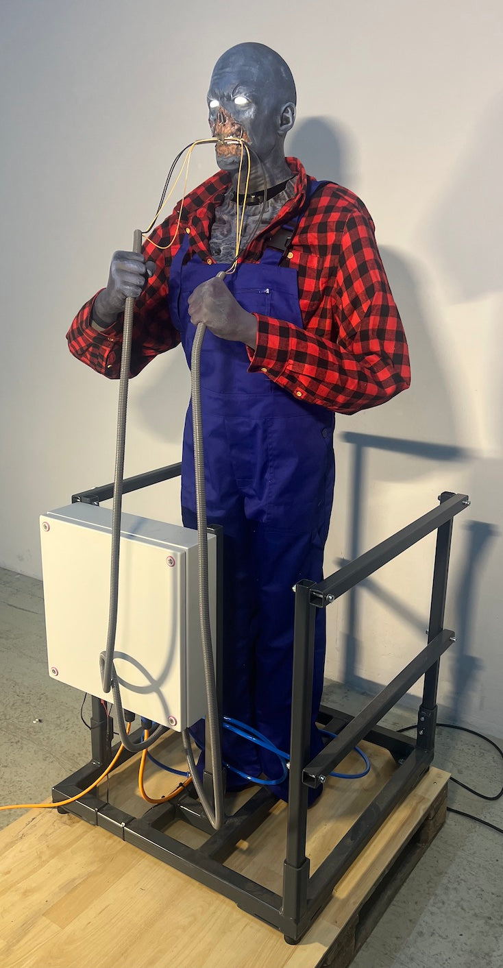 Zombie electrician bites into cable